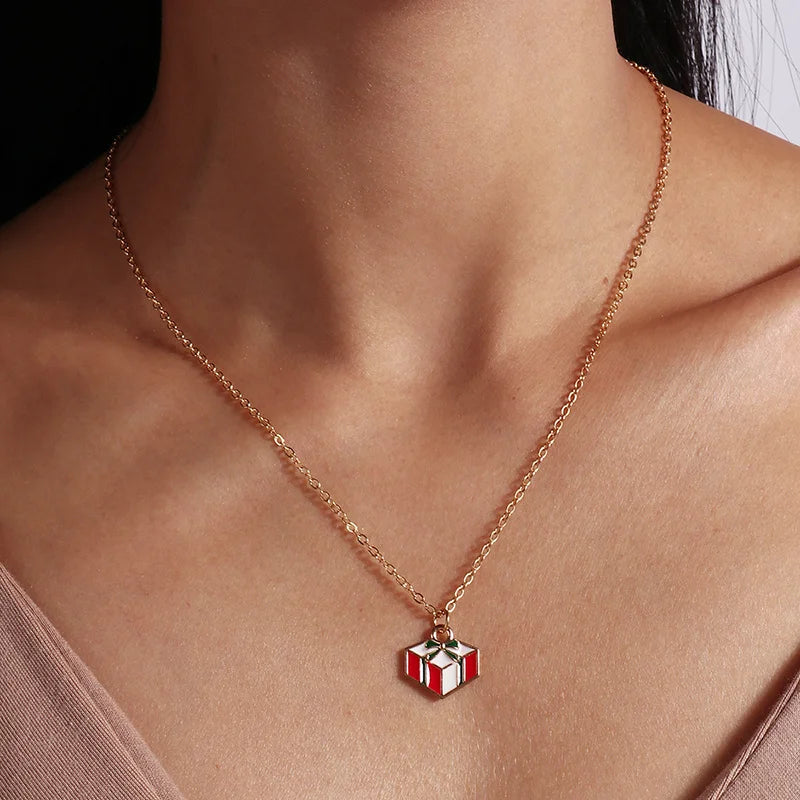 Kerst ketting met kerstboom, kerstman en belletjes hanger – feestelijke sieraden voor dames