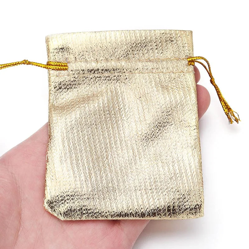 Kerst cadeau verpakking – Luxe goud en zilver geschenkzakjes met trekkoord