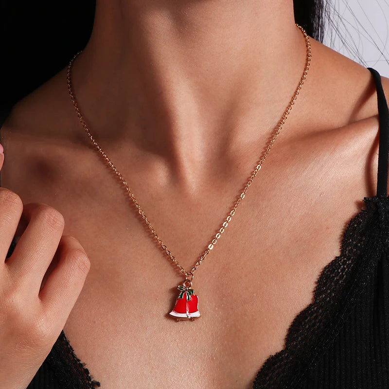 Kerst ketting met kerstboom, kerstman en belletjes hanger – feestelijke sieraden voor dames