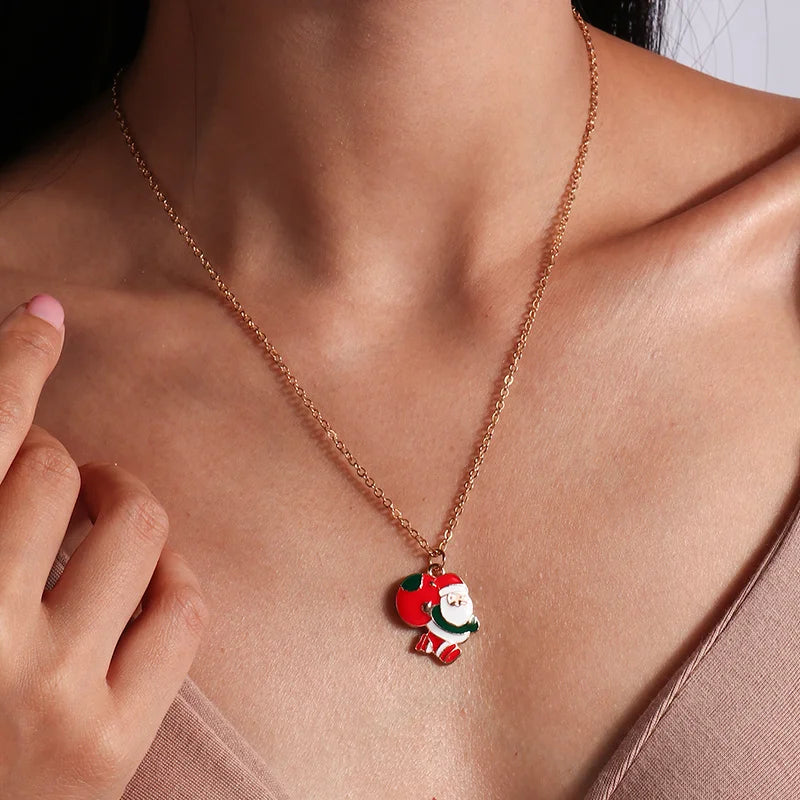 Kerst ketting met kerstboom, kerstman en belletjes hanger – feestelijke sieraden voor dames