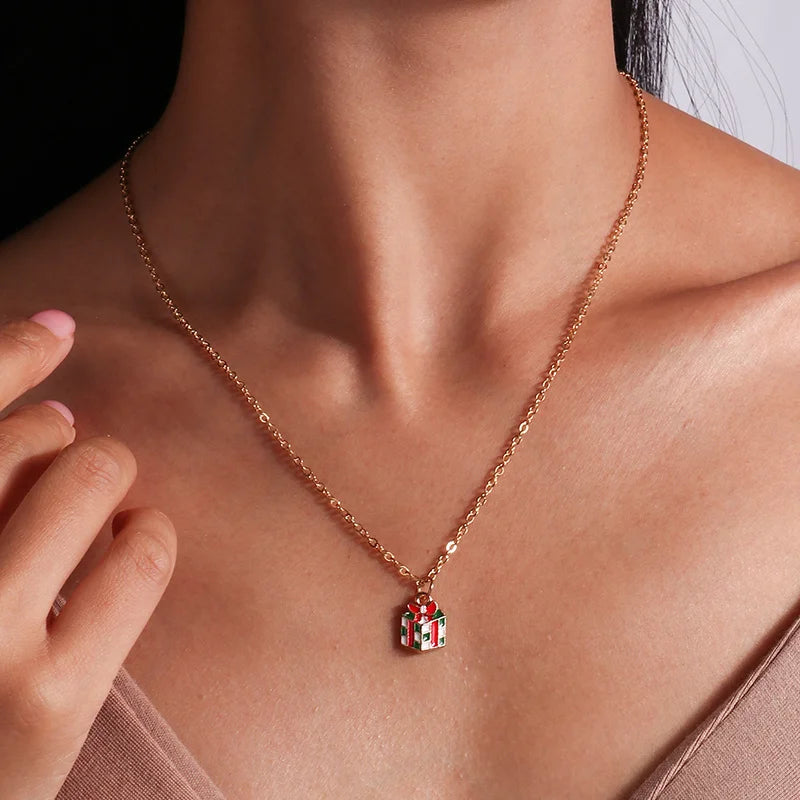 Kerst ketting met kerstboom, kerstman en belletjes hanger – feestelijke sieraden voor dames