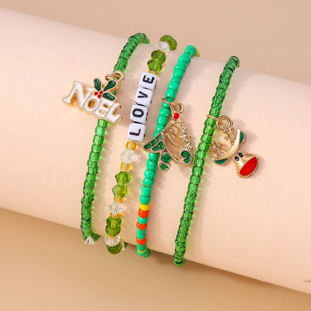 Kerst armbanden set met Kerstman, rendier en sneeuwpop bedels