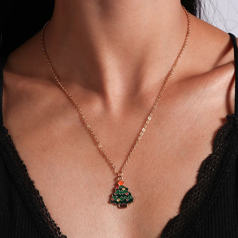 Kerst ketting met kerstboom, kerstman en belletjes hanger – feestelijke sieraden voor dames