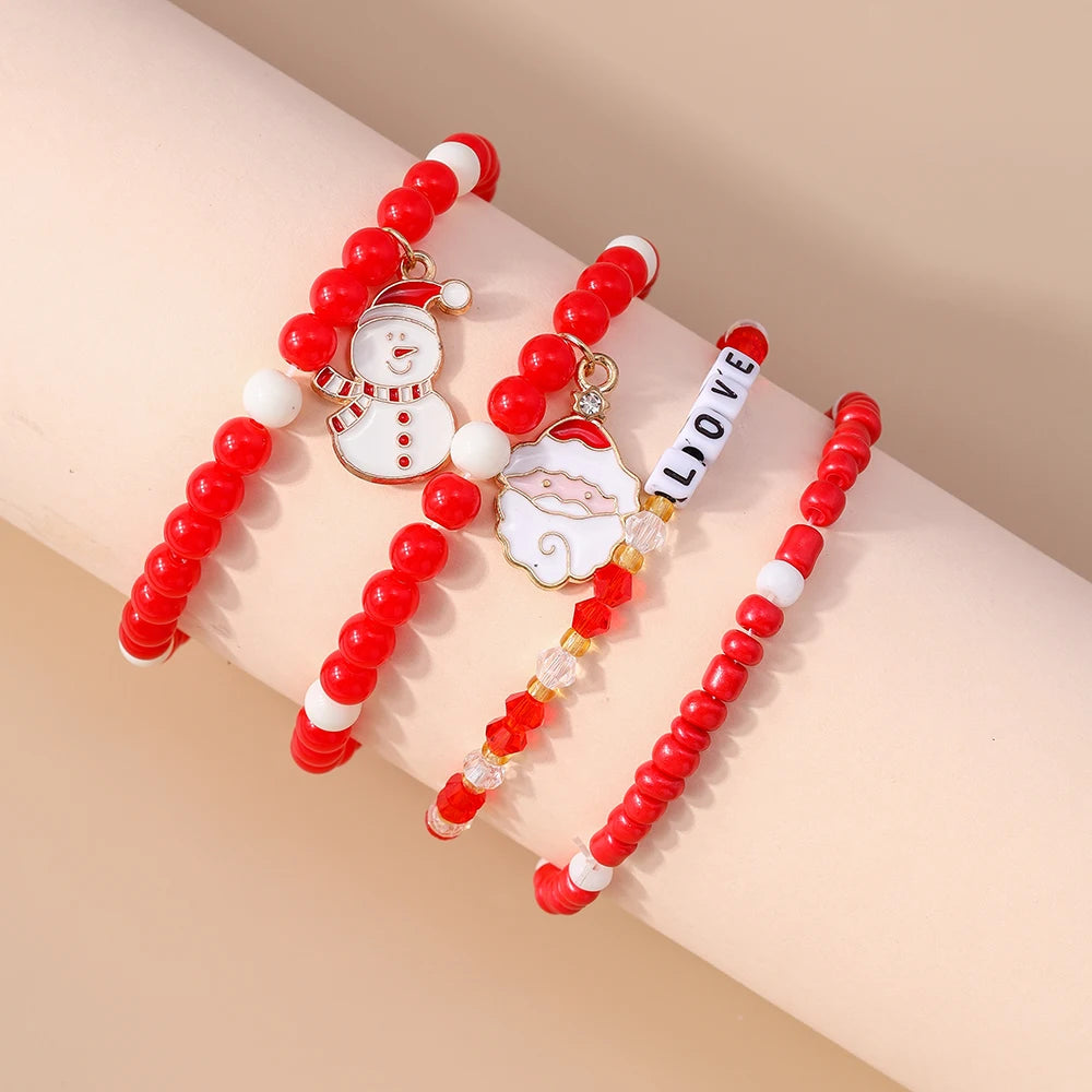 Kerst armbanden set met Kerstman, rendier en sneeuwpop bedels
