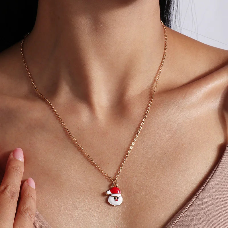 Kerst ketting met kerstboom, kerstman en belletjes hanger – feestelijke sieraden voor dames