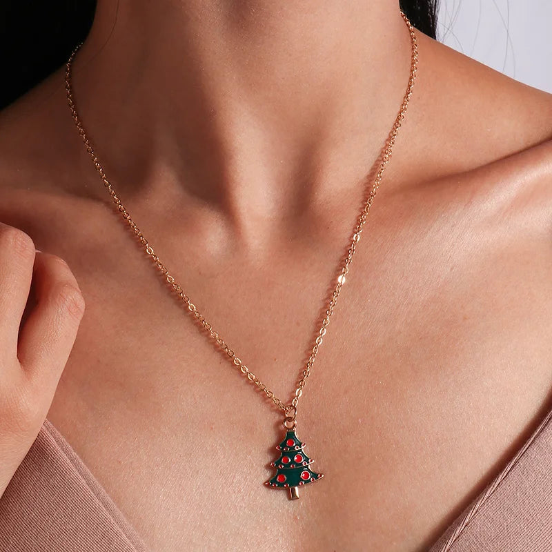 Kerst ketting met kerstboom, kerstman en belletjes hanger – feestelijke sieraden voor dames