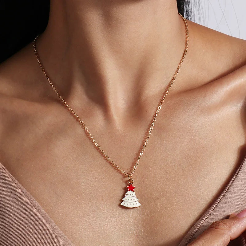 Kerst ketting met kerstboom, kerstman en belletjes hanger – feestelijke sieraden voor dames