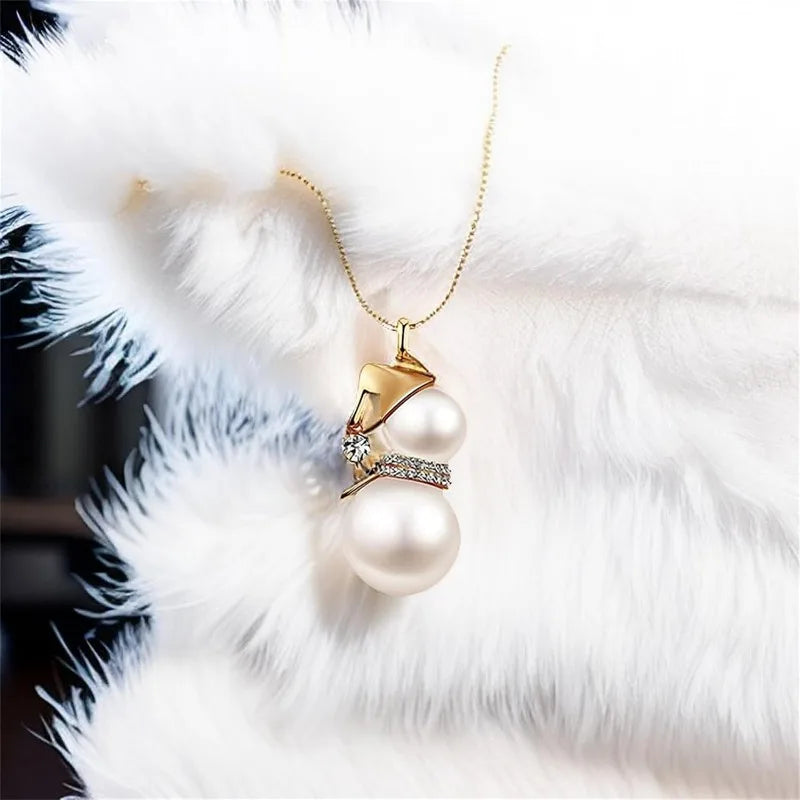 Kerst ketting sneeuwpop met parel en kristal – feestelijke lange ketting voor dames