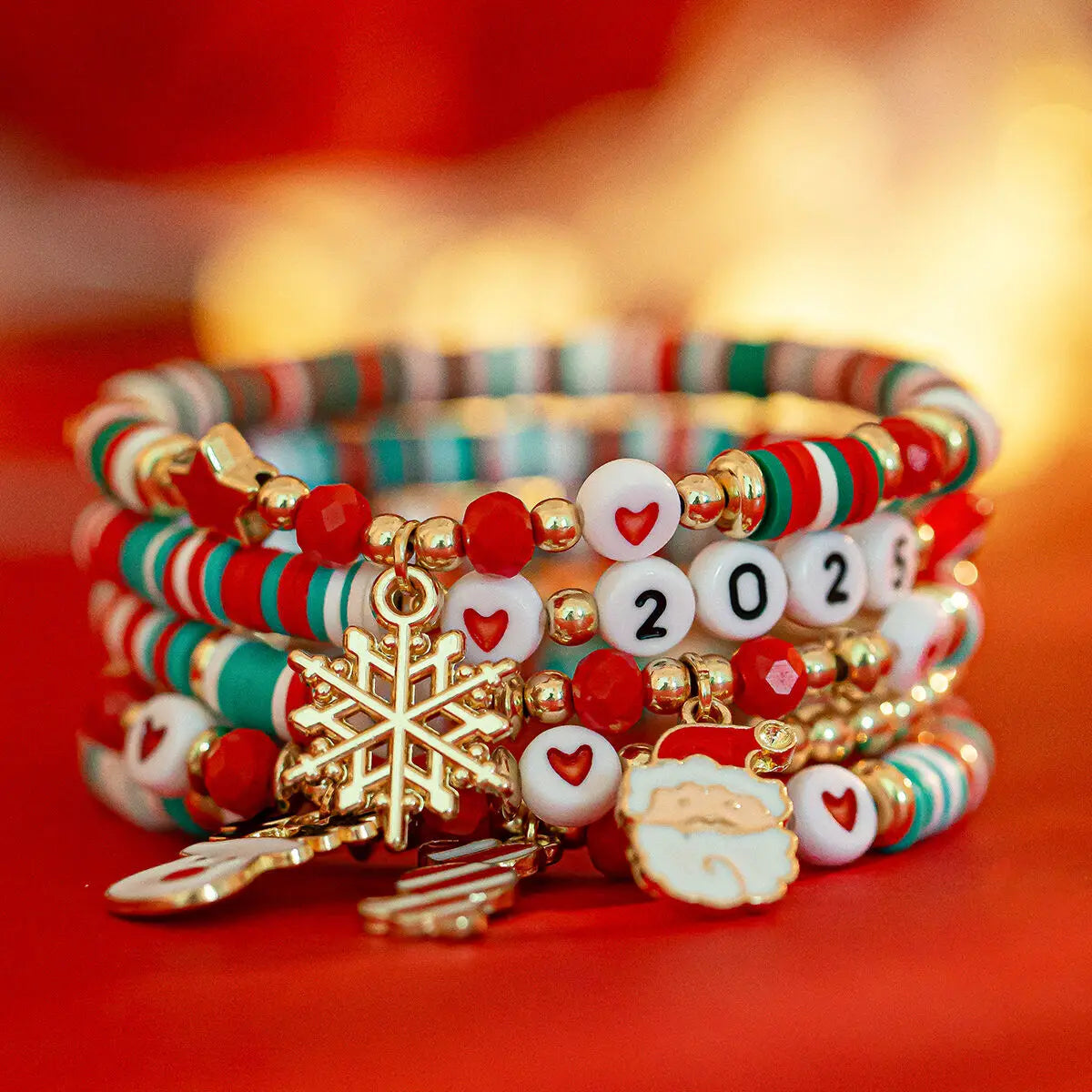 Kerst armbanden set met sneeuwvlok en bel hanger kralen