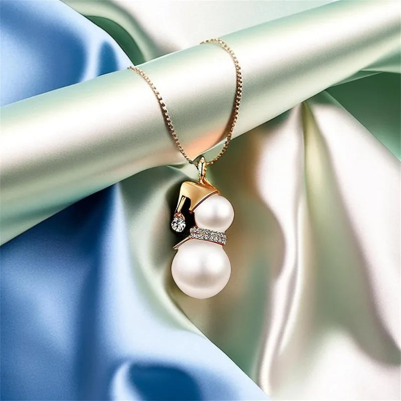 Kerst ketting sneeuwpop met parel en kristal – feestelijke lange ketting voor dames