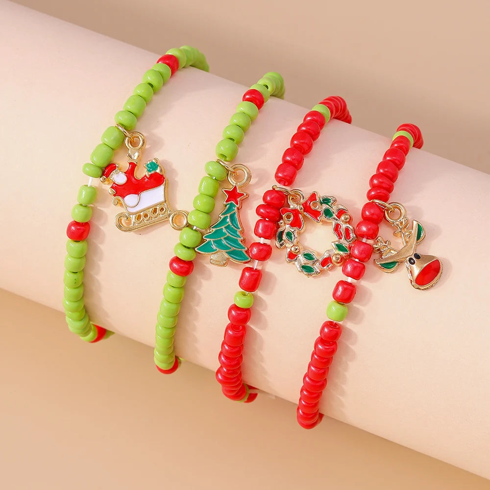 Kerst armbanden set met Kerstman, rendier en sneeuwpop bedels