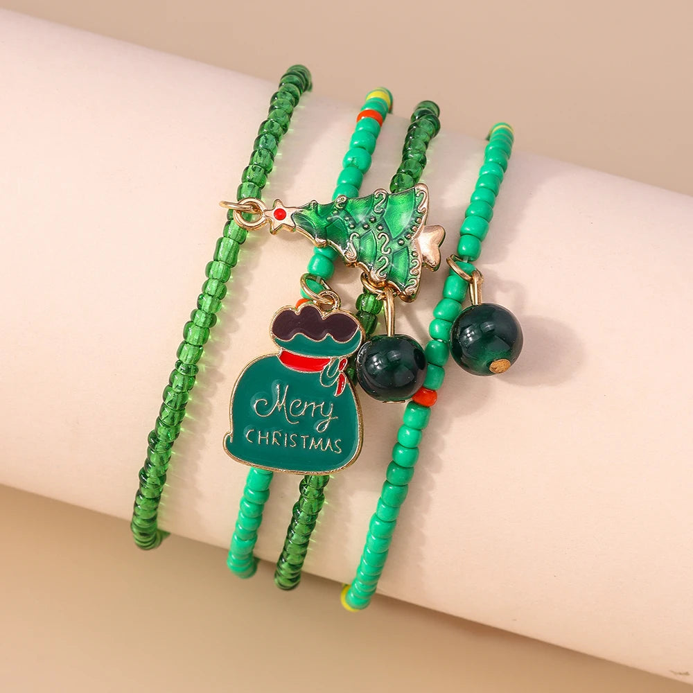 Kerst armbanden set met Kerstman, rendier en sneeuwpop bedels