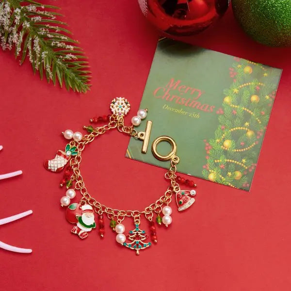 Kerst armband met kerstboom, sneeuwvlok, kerstman en belletjes