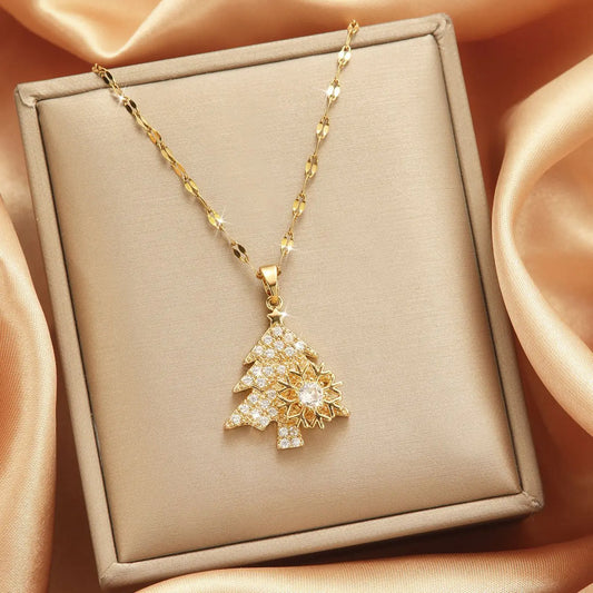 Kerst ketting met fonkelende sneeuwvlok en kerstboom hanger vol zirkonia