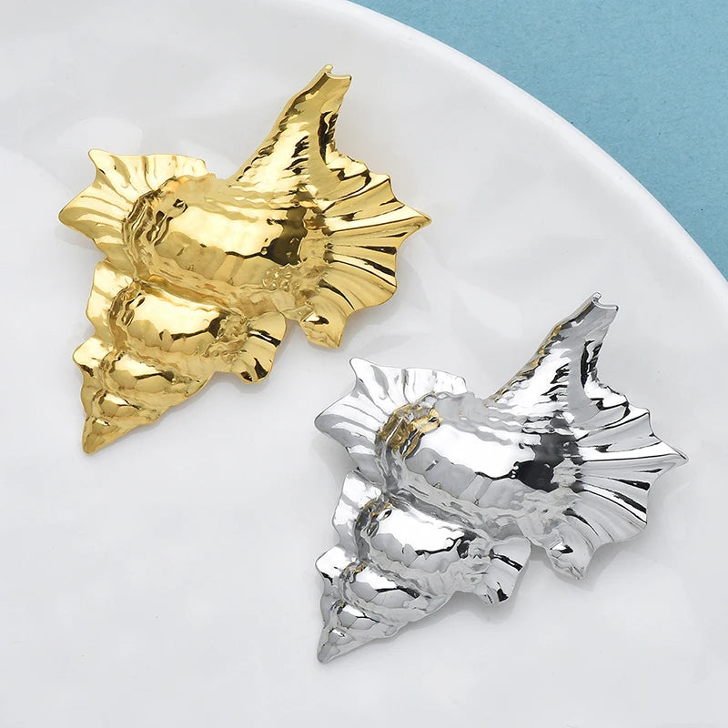 Broche schelpmotief van roestvrij staal – unisex accessoire in twee kleuren