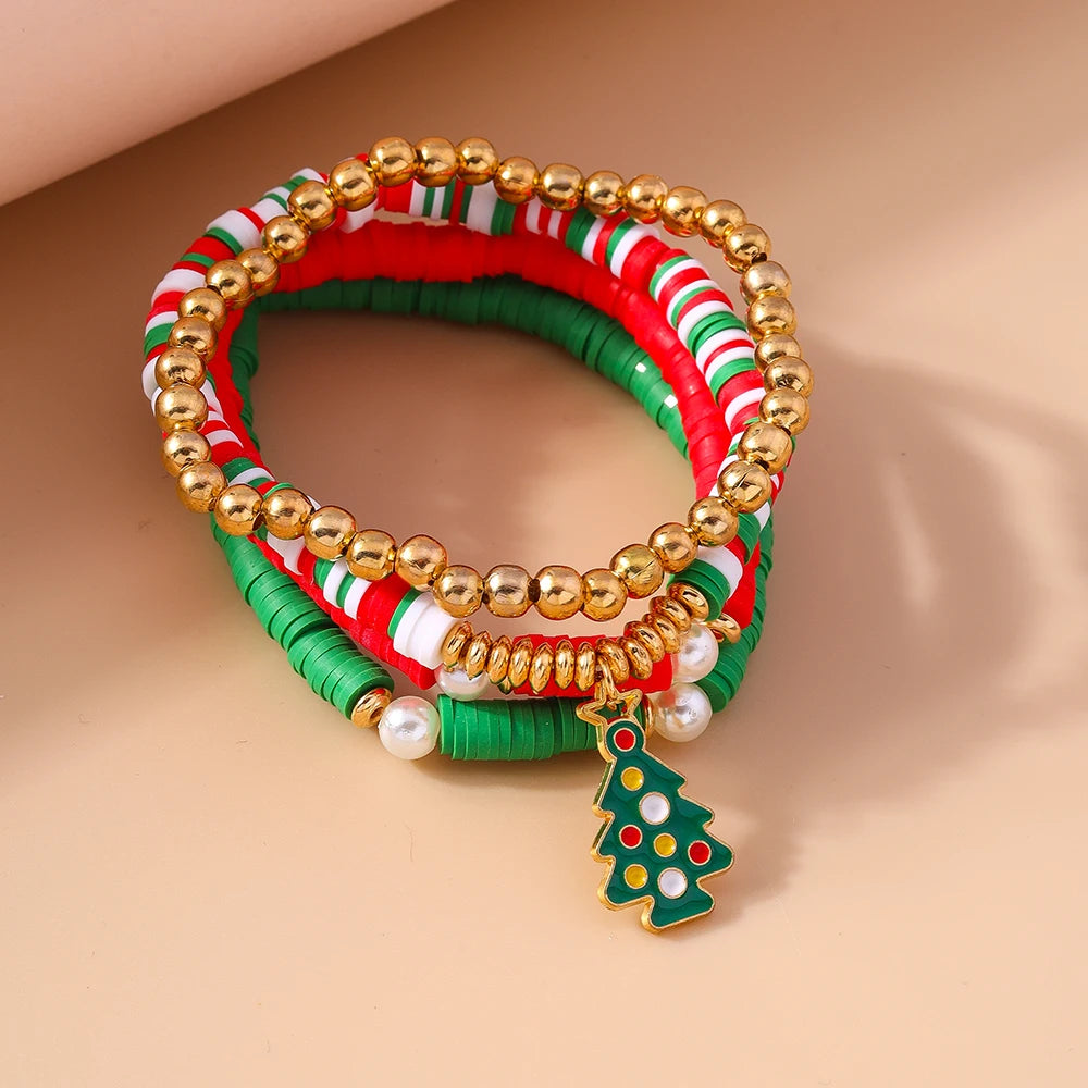 Kerst armbanden set met Kerstman, rendier en sneeuwpop bedels